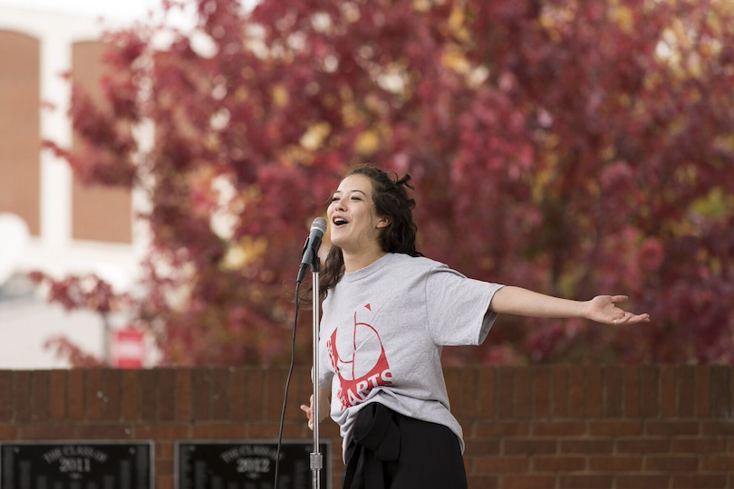 Student performing for the Spotlight on the Arts Festival on the outdoor stage at Tate Plaza