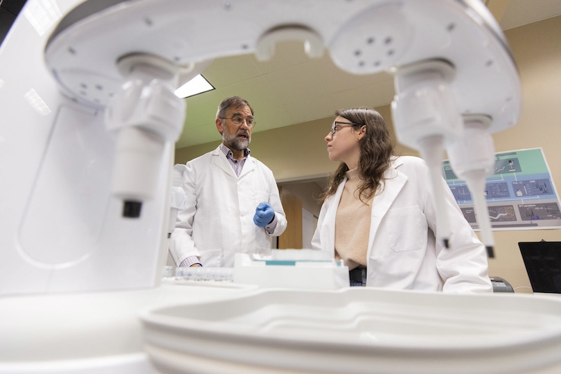 The UGA Foundation hopes to drive interest in UGA innovation and build on its success bringing new products to market. Pictured, professor Arthur Edison works with undergraduate Hailey Goldberg near an automated pipetting robot as they work together in Edison’s lab at the Complex Carbohydrate Research Center. (Photo by Andrew Davis Tucker/UGA taken in early March 2020)