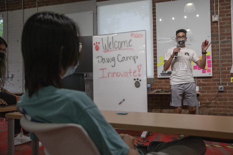 Hussain Hassan pitching his team's idea at Dawg Camp Innovate.