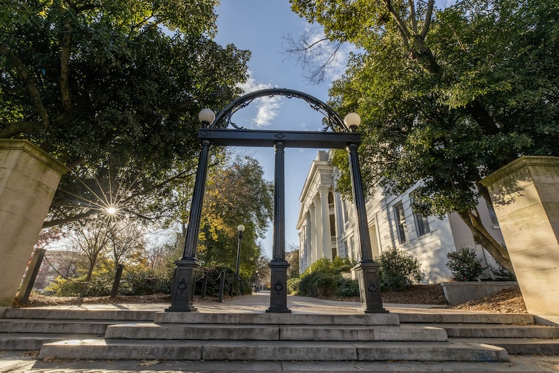 The Arch with the North Campus sidewalk and the Holmes-Hunter Academic building in the background.