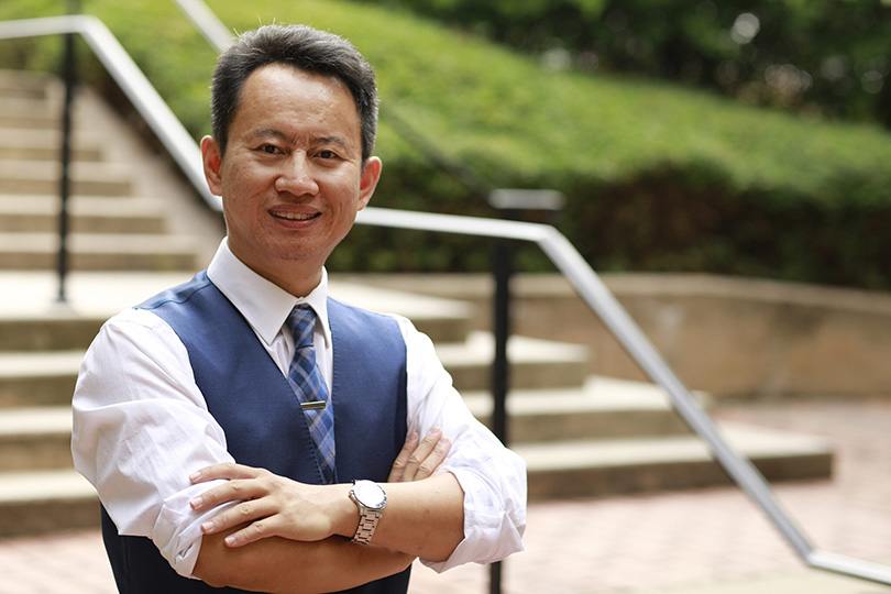 Environmental portrait of Associate Professor Xiaoming Zhai, director of the AI4STEM Education Center, who will lead the GENIUS Center research team. (Submitted photo)